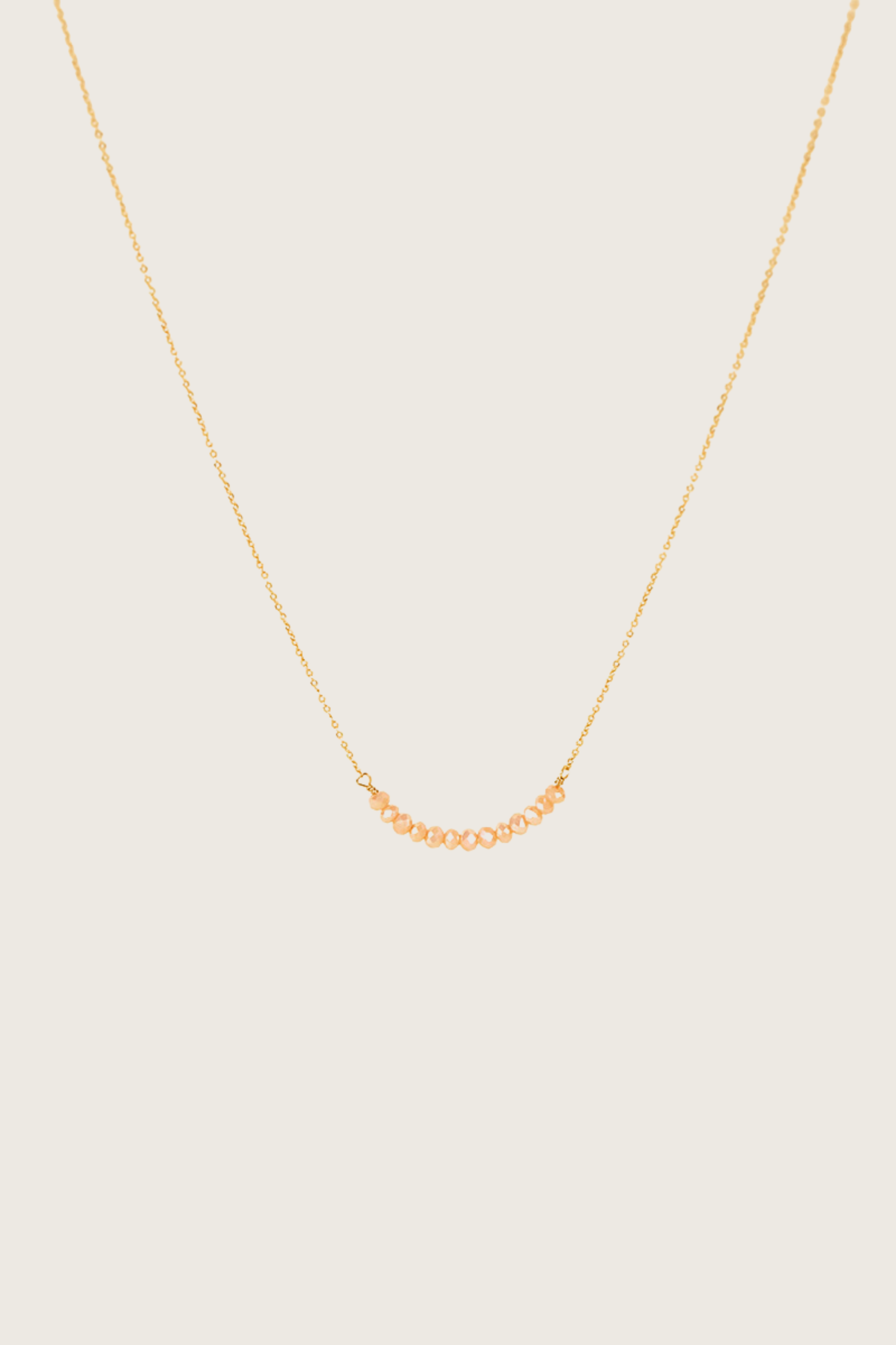 Osja 14K gouden inleg Peche kristallen ketting